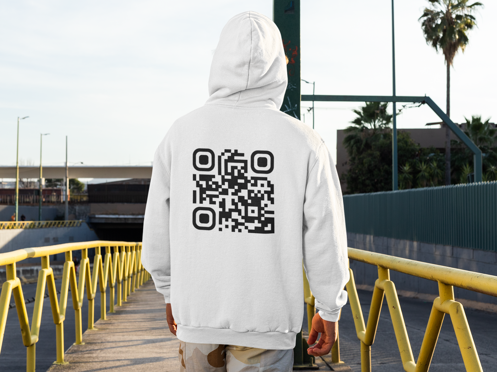 back-view-hoodie-mockup-of-a-man-standing-on-a-city-street-m523-5.png