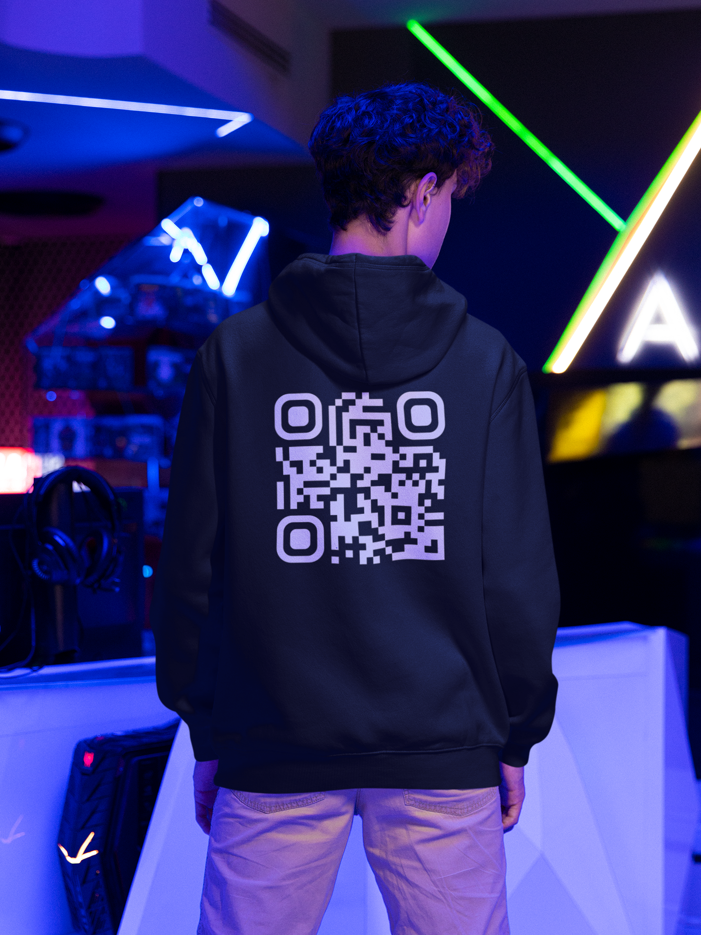 back-view-mockup-of-a-man-wearing-a-hoodie-at-a-gamer-s-arena-m28534-4.png