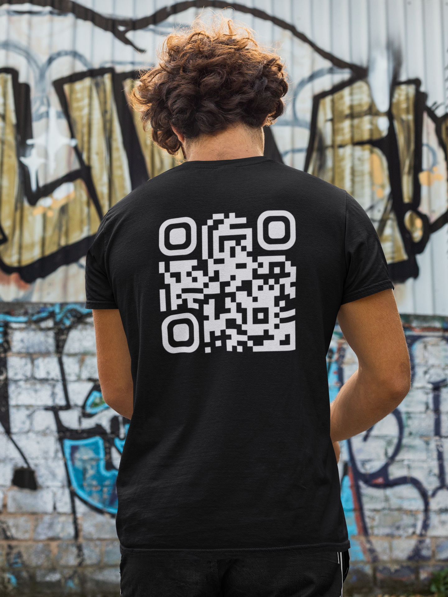 back-view-t-shirt-mockup-of-a-man-in-front-of-a-wall-with-graffiti-m520-6.png